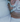 Man sleeping with a CPAP mask for sleep apnea therapy in bed.